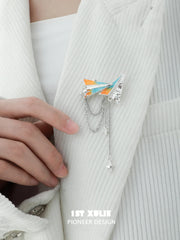1ST XULIE "Juicy Flight" Playful Paper Plane Chain Brooch in Platinum Plated Brass - Detail Shot