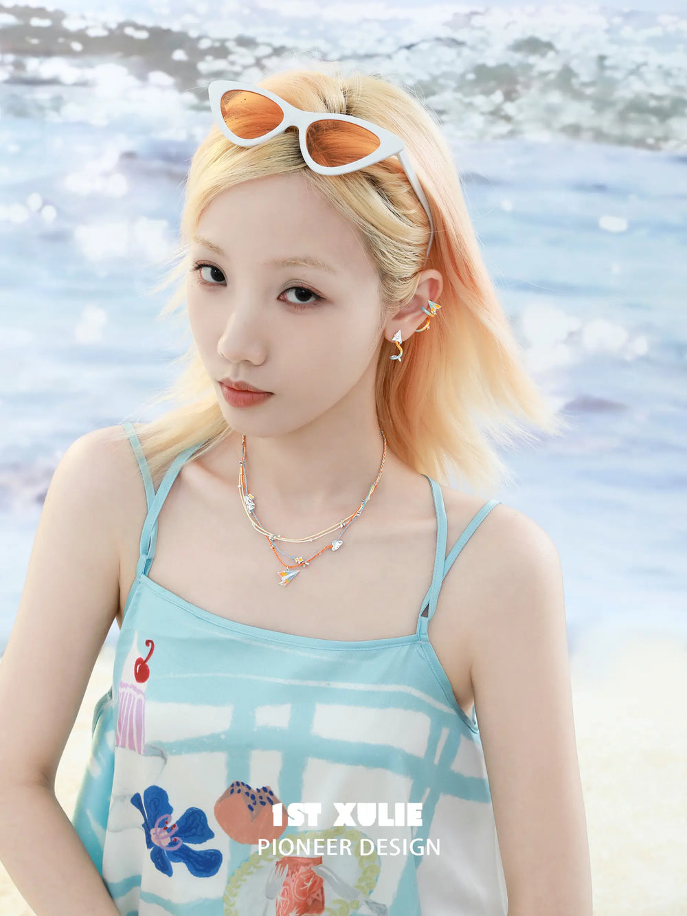1ST XULIE "Juicy Flight" Playful Paper Plane Rope Choker in Platinum Plated Brass - Angled Product View