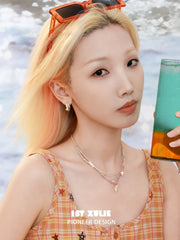 1ST XULIE "Juicy Flight" Playful Paper Plane Rope Choker in Platinum Plated Brass - Detail Shot