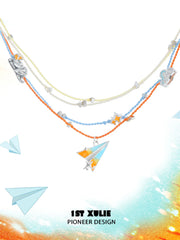 1ST XULIE "Juicy Flight" Playful Paper Plane Rope Choker in Platinum Plated Brass - Product View