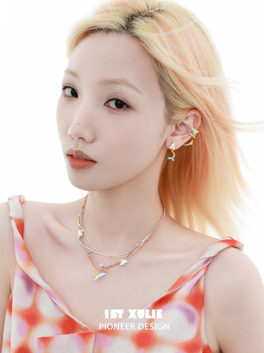 1ST XULIE "Juicy Flight" Playful Paper Plane Rope Choker in Platinum Plated Brass - On Model Close Up