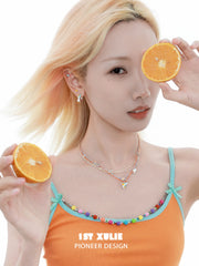 1ST XULIE "Juicy Flight" Playful Paper Plane Rope Choker in Platinum Plated Brass - Side View