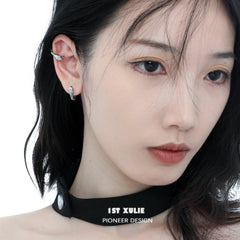1ST XULIE "Frozen Serpent" Serpent Bite Stud Earrings in Platinum Plated - Detail Shot On Model