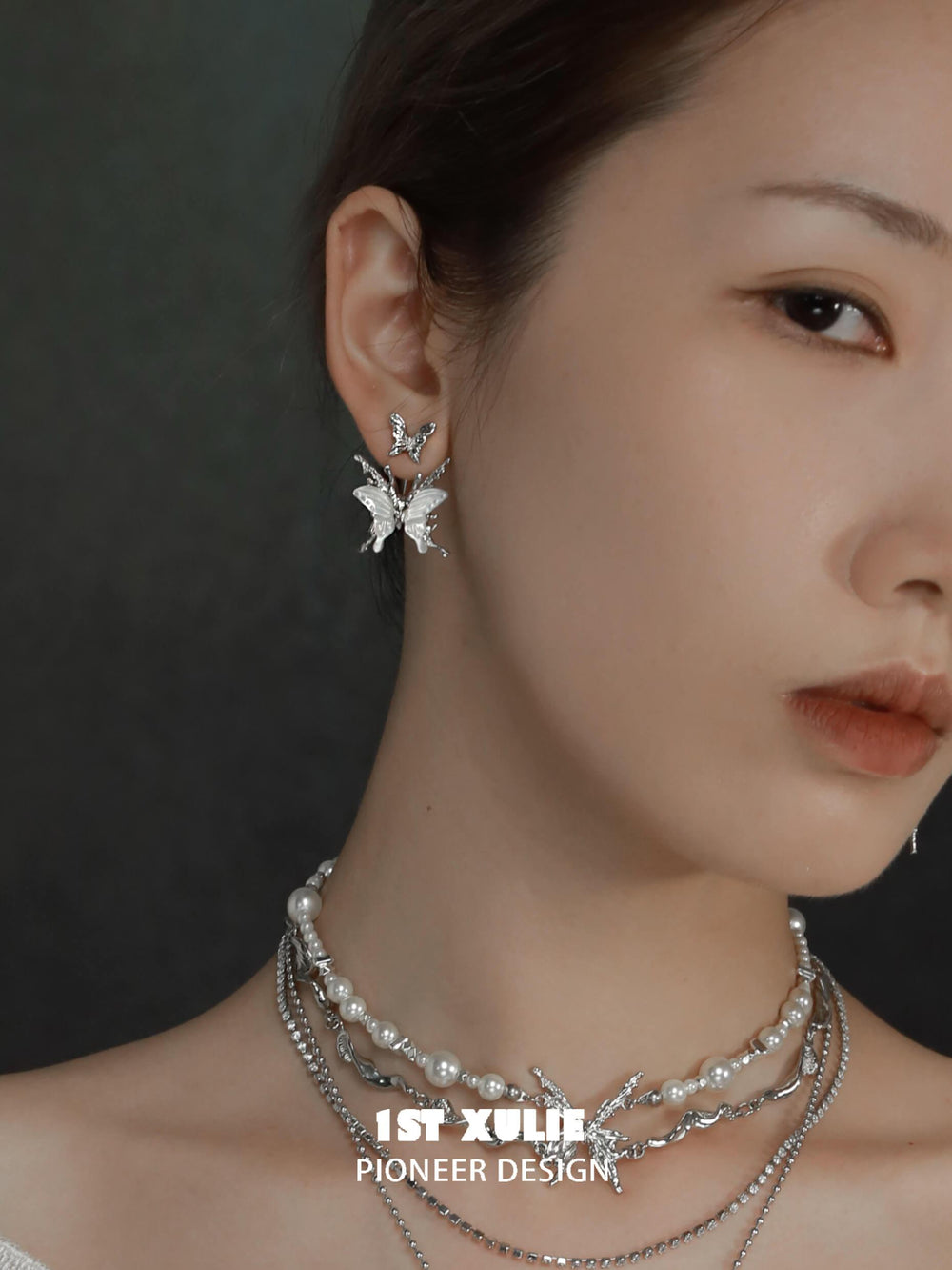 1ST XULIE "Whiterfly" Skeletal Shell Earrings in Platinum Plated 925 Silver - Lifestyle Shot