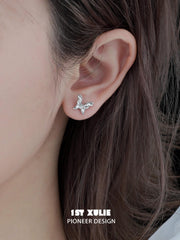 1ST XULIE "Whiterfly" Skeletal Shell Earrings in Platinum Plated 925 Silver - On Model Close-up