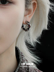 1ST XULIE "Snake Bite" Statement Leather Hoop Earrings in Platinum Plated Brass - Angled View