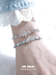 1ST XULIE "Snow Land" Snowflake Charm Bracelet in Platinum Plated - Angle View 1