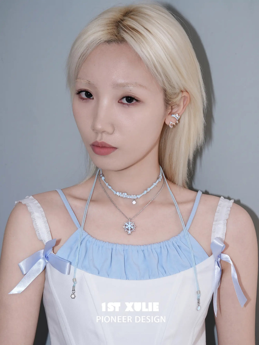 1ST XULIE Jewelry "Snow Land" Snowflake Spinning Pendant Necklace in Platinum Plated Brass - Lifestyle Shot