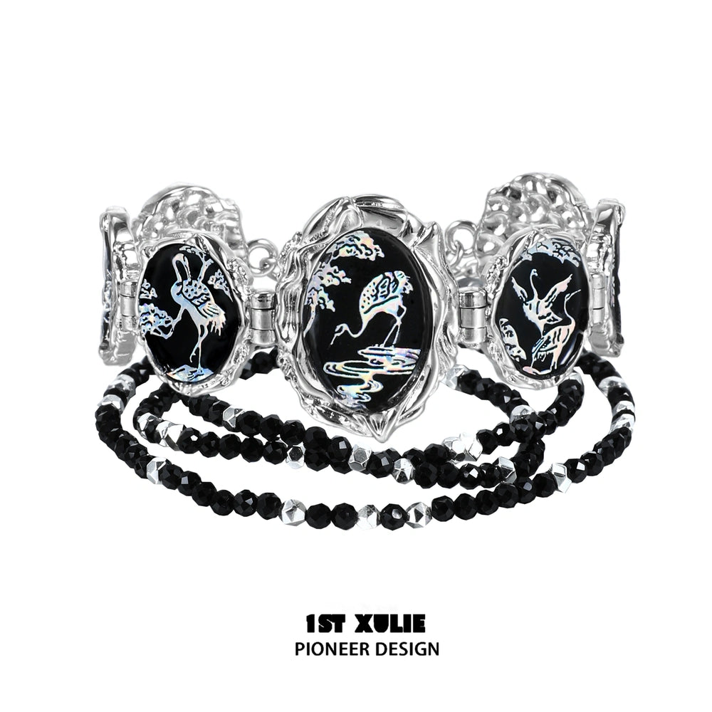 1ST XULIE "Soaring Cranes" Hand Chain in Platinum Plated - On Model