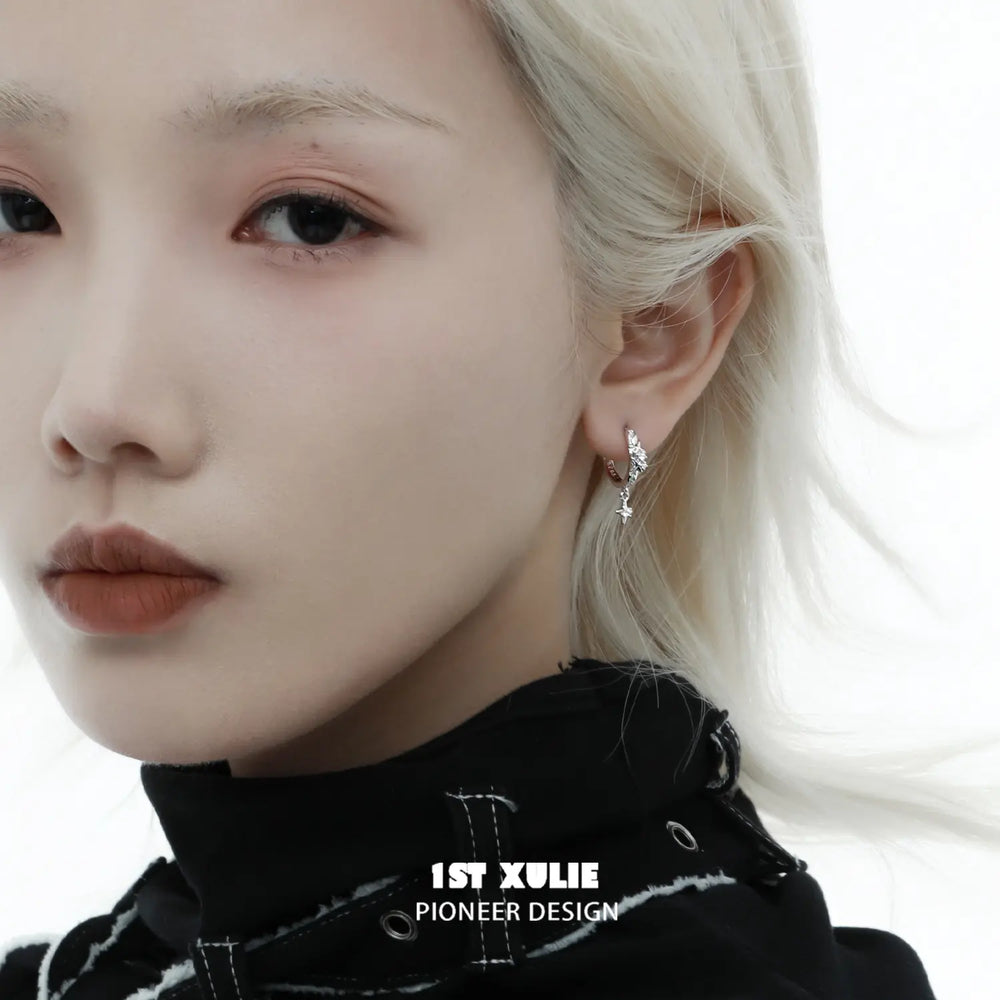 1ST XULIE "Silver Angel" Sparkling Angel Wing Huggie Hoops in 925 Sterling Silver - Angled Product View