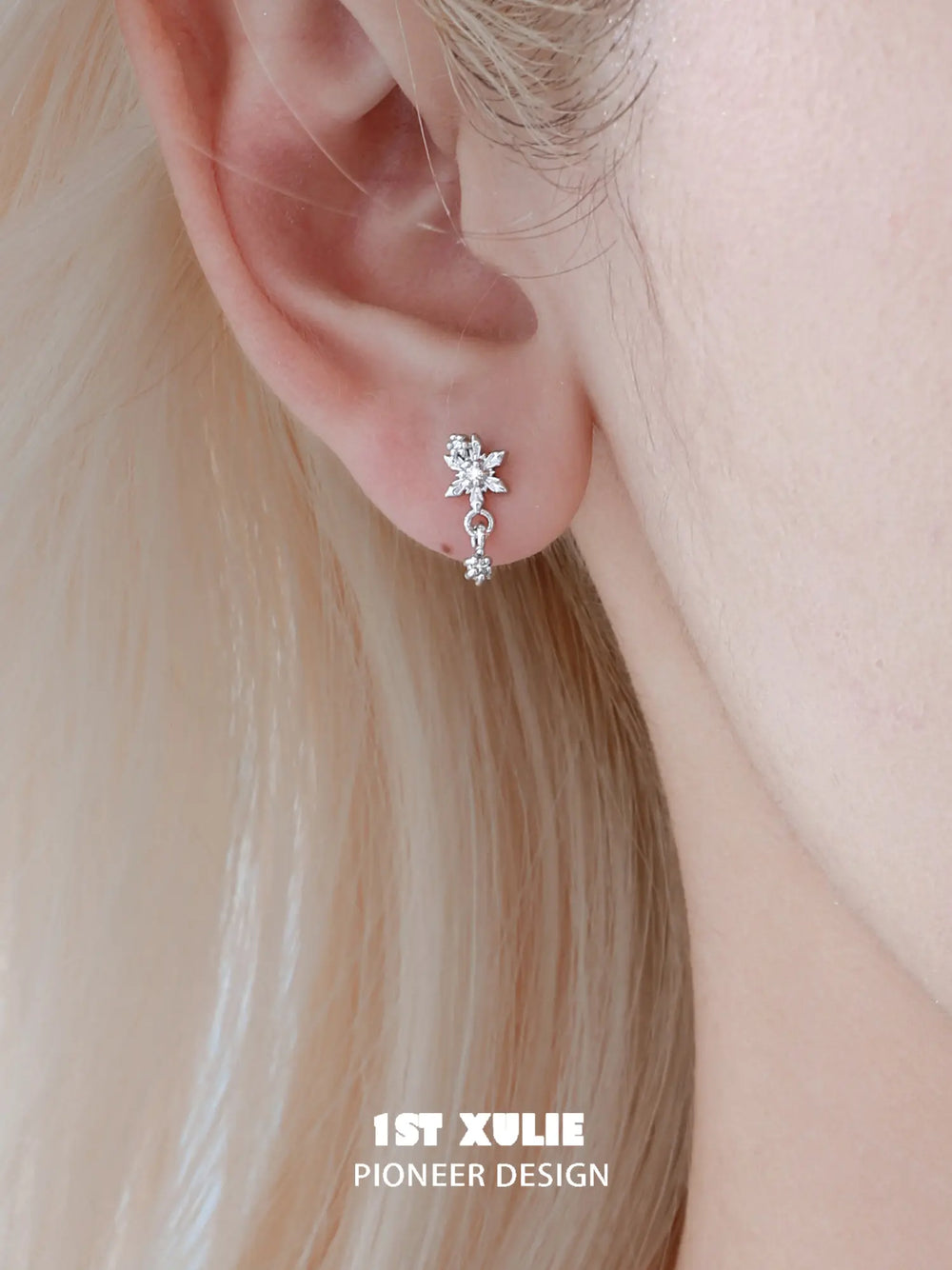 1ST XULIE Jewelry "Snow Land" Sparkling Snowflake Huggie & Stud Earrings in Platinum Plated - Texture Shot