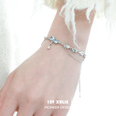 1ST XULIE "THE SEA" Sparkling Zirconia Tennis Bracelet in Platinum Plated - On Model