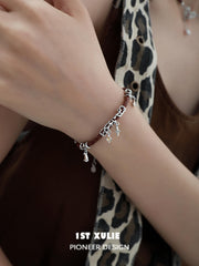 1ST XULIE "Rose Believer" Statement Leather Tassel Bangle in 925 Sterling Silver - Detail Shot
