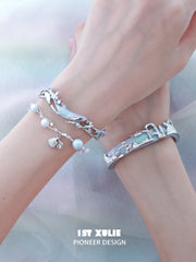 1ST XULIE "ATLANTIS" Statement Whale & Pearl Cuff Bangle in Platinum Plated - On Model Close Up