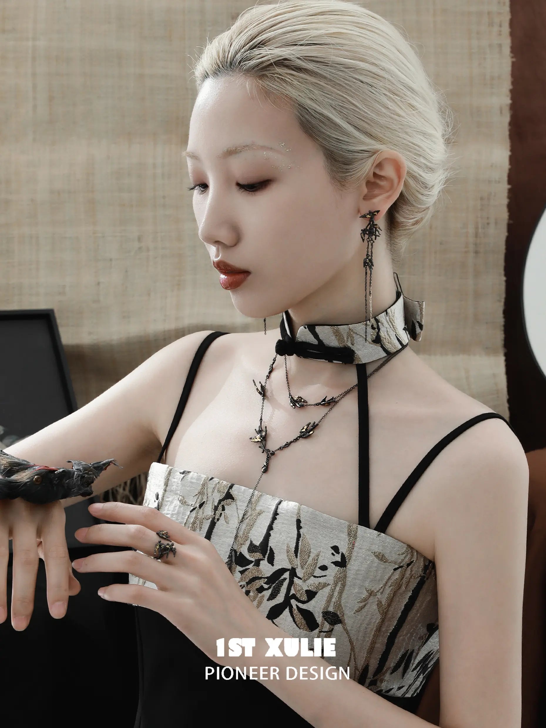 1ST XULIE "Swallow's Return" Swallow Tassel Dangle Earrings in 18K Black Gold Plated - Lifestyle Shot 1ST XULIE "Swallow's Return" Swallow Tassel Dangle Earrings in 18K Black Gold Plated - Lifestyle Shot
