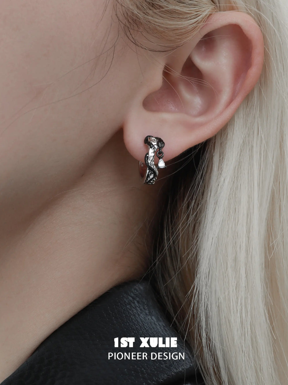 1ST XULIE "Snake Bite" Two-Tone Zirconia Statement Huggie Hoop Earrings in Platinum & 18K Black Gold Plating - Detail Shot