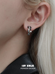 1ST XULIE "Snake Bite" Two-Tone Zirconia Statement Huggie Hoop Earrings in Platinum & 18K Black Gold Plating - Detail Shot