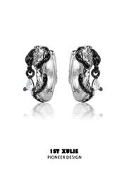 1ST XULIE "Snake Bite" Two-Tone Zirconia Statement Huggie Hoop Earrings in Platinum & 18K Black Gold Plating - Lifestyle Shot