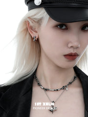 1ST XULIE "Snake Bite" Two-Tone Zirconia Statement Huggie Hoop Earrings in Platinum & 18K Black Gold Plating - On Model