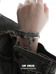 1ST XULIE Jewelry "Irises" Vintage Oxidized Cross Cuff Bangle in Rhodium Plated - Angle View