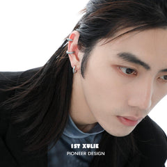 1ST XULIE "THE SEA" Wave Statement C-Hoop Earrings in Platinum Plated - On Model Close-up