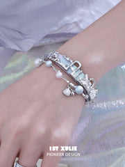 1ST XULIE "ATLANTIS" Whale & Pearl Layered Bracelet Set in Platinum Plated Brass - Lifestyle Shot