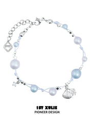 1ST XULIE "ATLANTIS" Whale & Pearl Layered Bracelet Set in Platinum Plated Brass - On Model Close Up