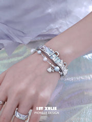 1ST XULIE "ATLANTIS" Whale & Pearl Layered Bracelet Set in Platinum Plated Brass - Texture Detail