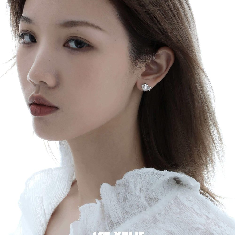 1ST XULIE "Whiterfly" Dainty White Agate Butterfly Stud Earrings in 925 Sterling Silver - On Model Close-up