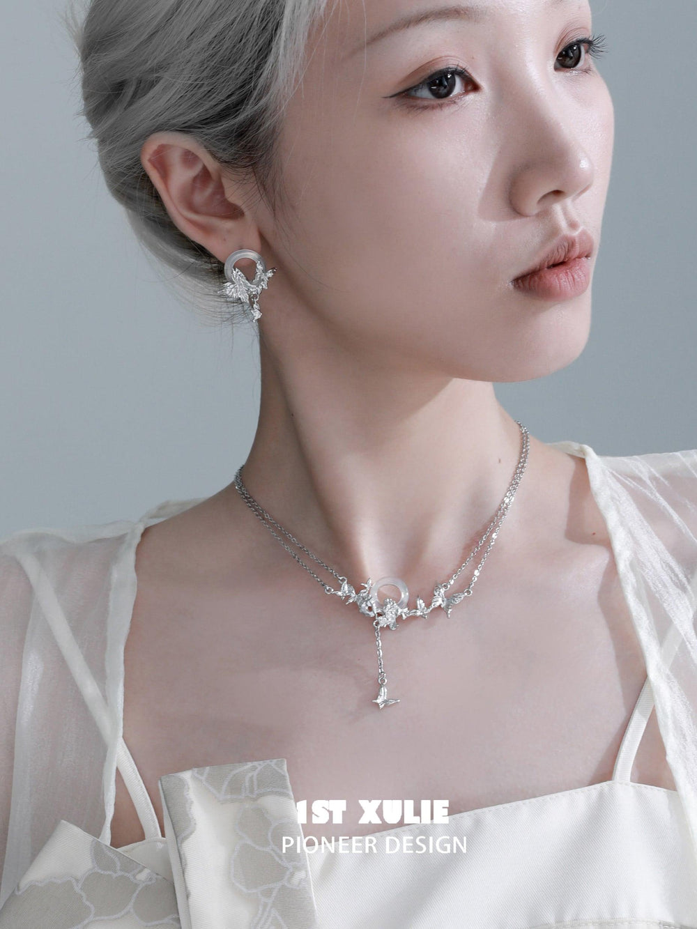 1ST XULIE "Whiterfly" White Chalcedony Butterfly Drop Earrings in Platinum Plated - Lifestyle Shot