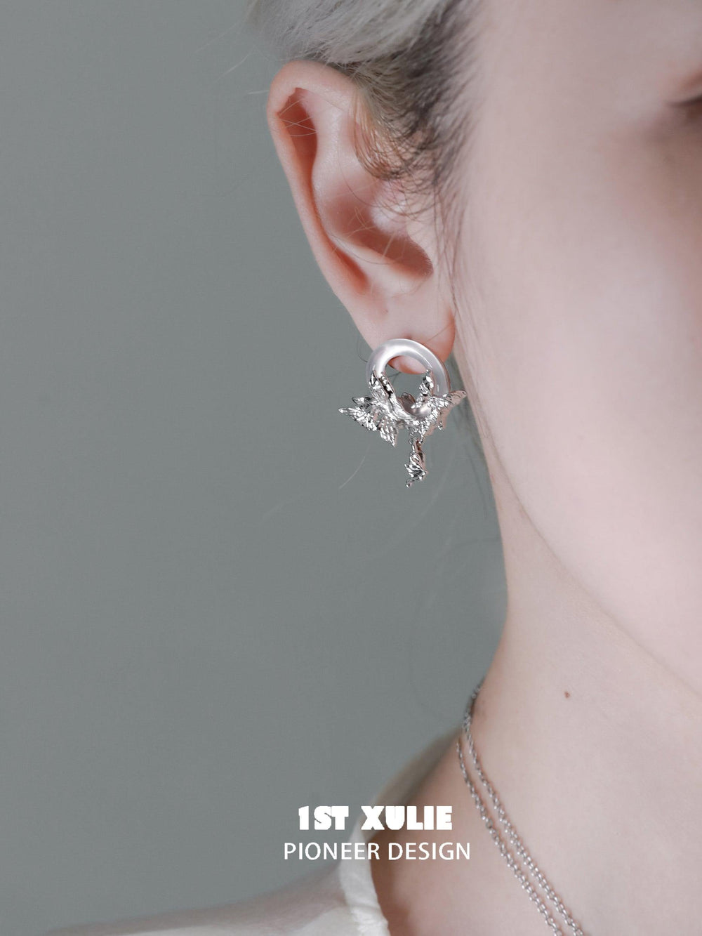1ST XULIE "Whiterfly" White Chalcedony Butterfly Drop Earrings in Platinum Plated - On Model Close-up