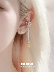 1ST XULIE Jewelry "WISHING STAR" Blue Zirconia Wishing Star Stud Earring in Rhodium Plated Brass - Detail Shot