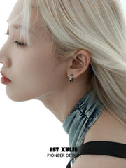 1ST XULIE "Mini World" Travel-Inspired World Map Huggie Hoop Earrings in Platinum Plated - Lifestyle Shot