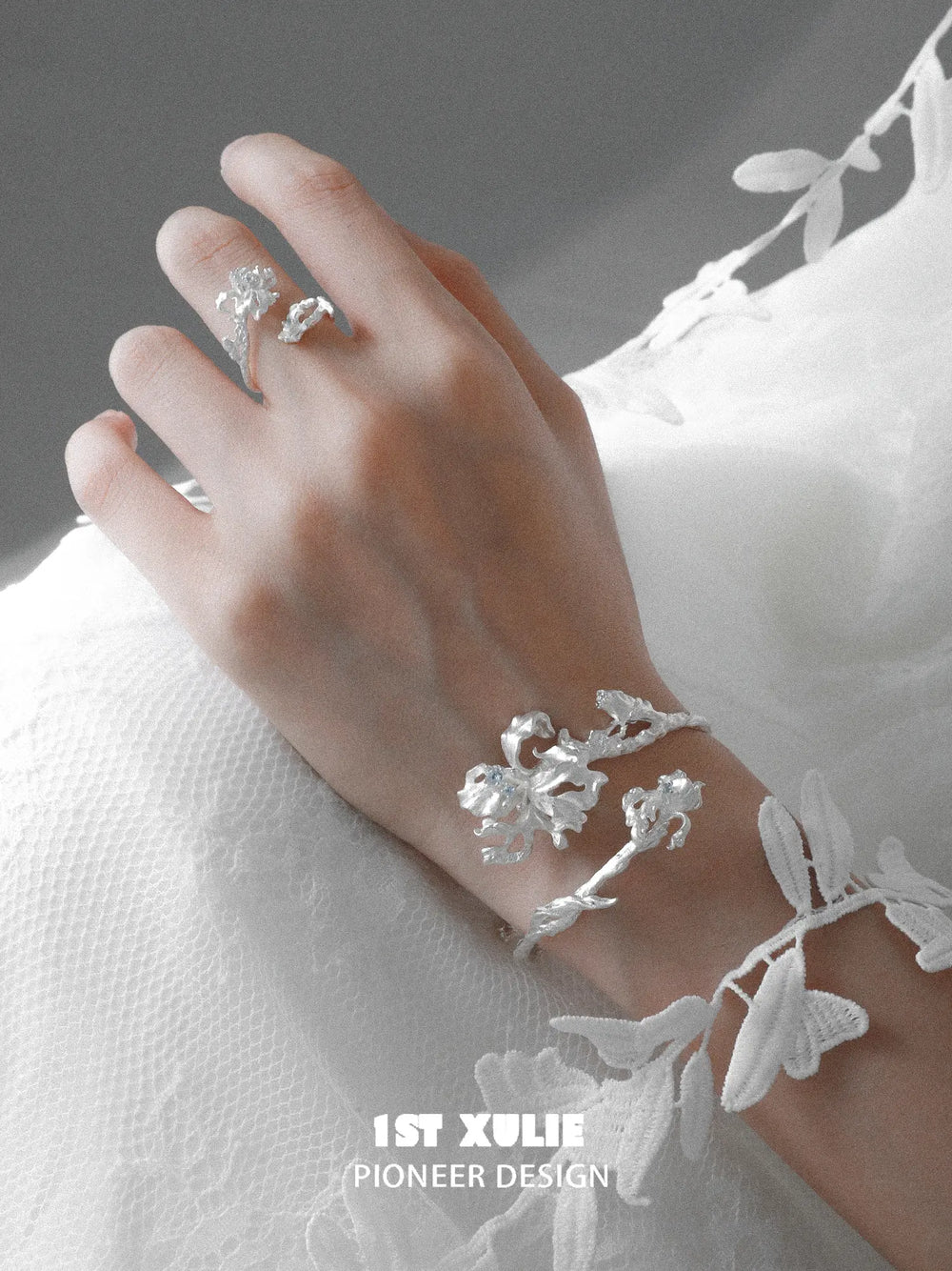 1ST XULIE Jewelry "Irises" Zirconia Iris Bangle in Rhodium Plated - On Model