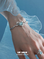 Loong-Ling Loong アクアマリン 18K プラチナメッキ 調節可能 オープンバングルブレスレット™