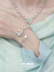 輝く18Kプラチナメッキパールチューリップブレスレットバングル™