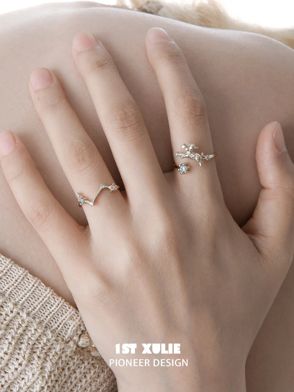 Ram and constellation open rings worn with coordinating jewelry