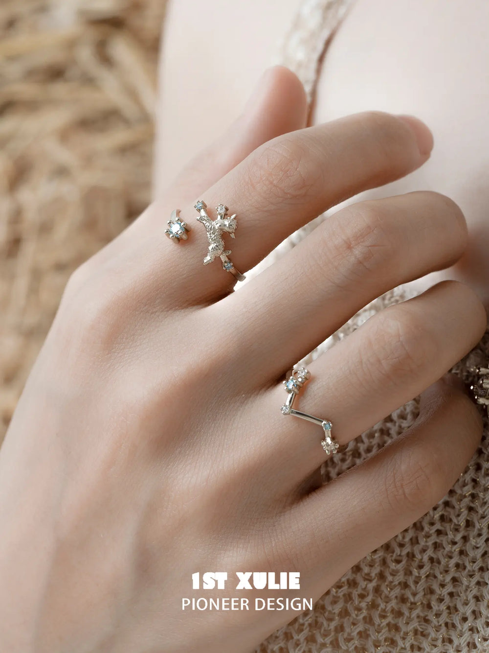 Ram and constellation open rings worn with coordinating jewelry
