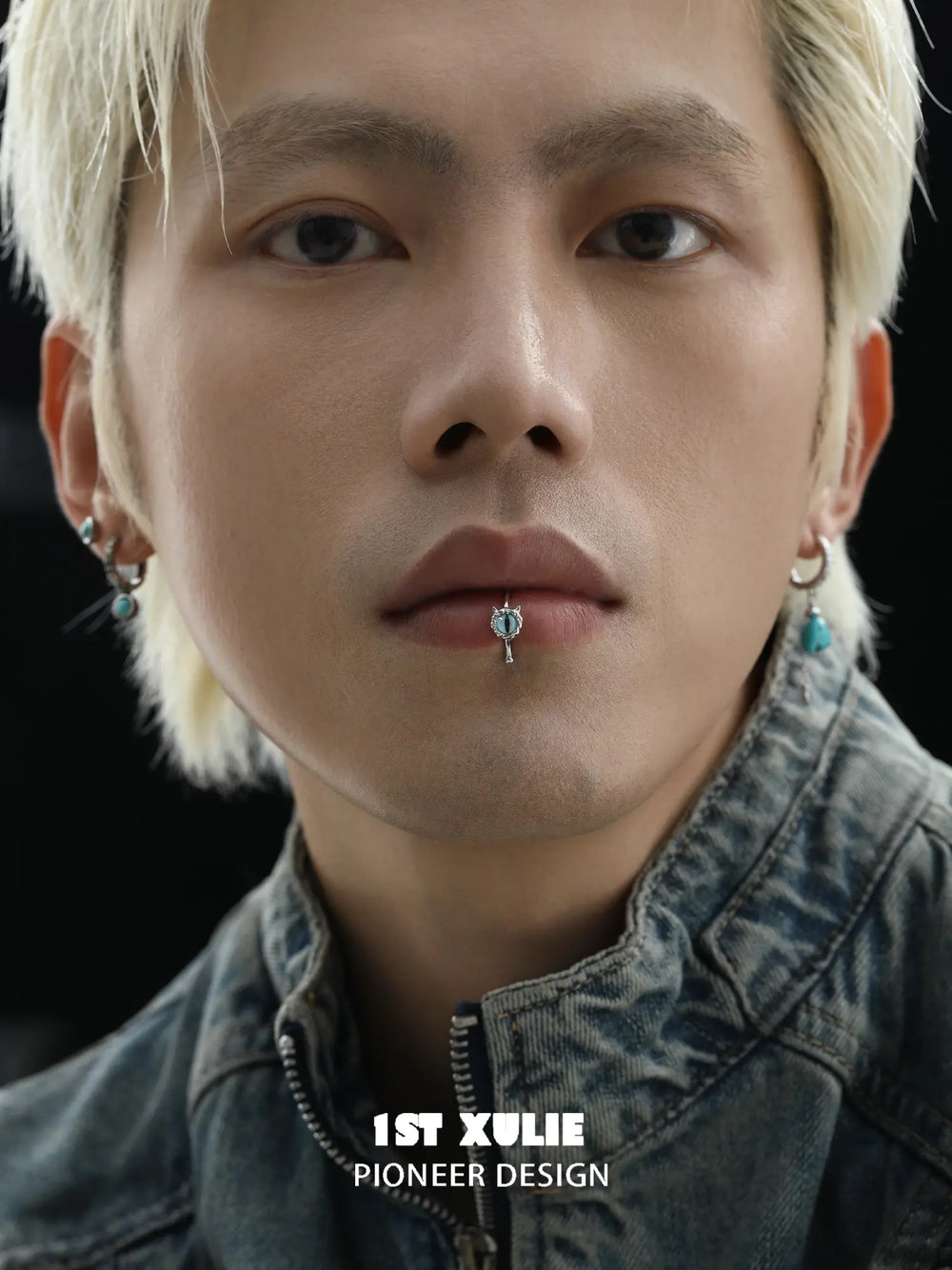 Blue eye lip cuff worn at the lower lip
