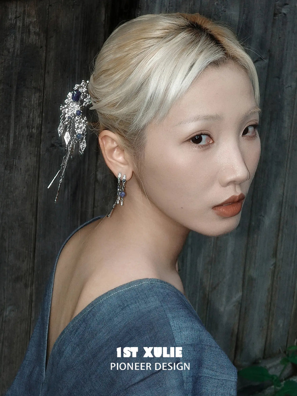 Side view showing the blue stone hair pin above the ear
