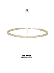 Style A narrow gold-toned choker with an extension chain