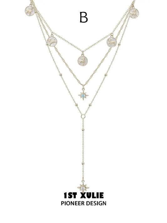 Style B layered pendant necklace with fine chains and celestial drops