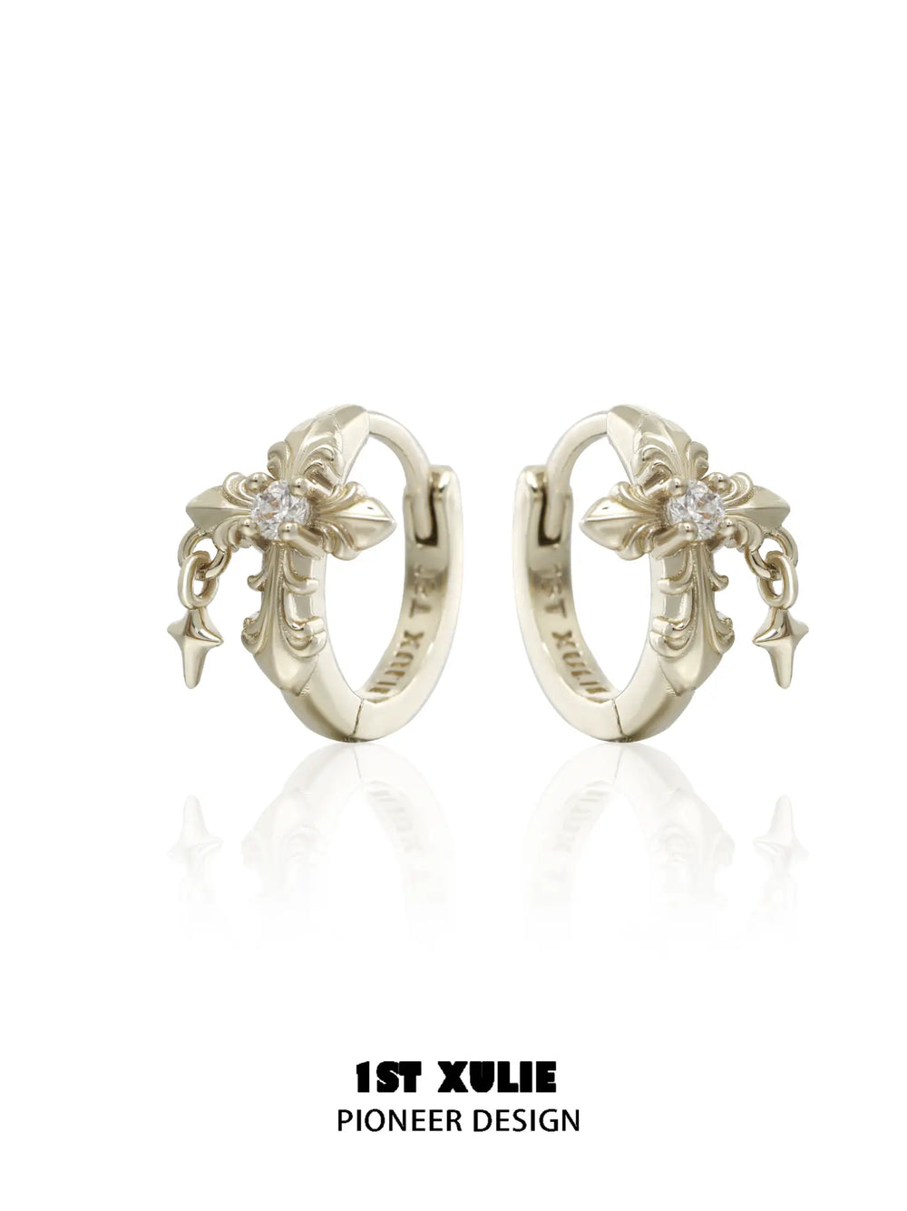 Gold-toned fleur-de-lis hoop earrings with clear stones and small hanging drops