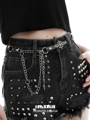 Gothic chain belt worn through dark trouser loops