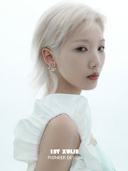 1ST XULIE "Whiterfly" Asymmetrical Butterfly Wing Stud Earrings in Platinum & 24K Gold - Lifestyle Shot