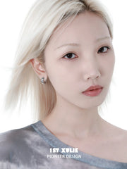 1ST XULIE Jewelry "THE SEA" Asymmetrical Ocean Wave Huggie Hoop Earrings - Lifestyle Shot