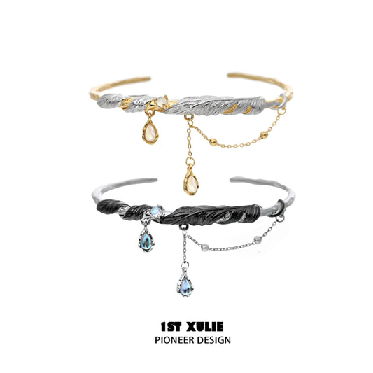 1ST XULIE "Lucifer" Platinum Plated Black Swan Wing Statement Cuff Bangle in Platinum Plated - Angle View