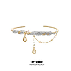 1ST XULIE "Lucifer" Platinum Plated Black Swan Wing Statement Cuff Bangle in Platinum Plated - Back View