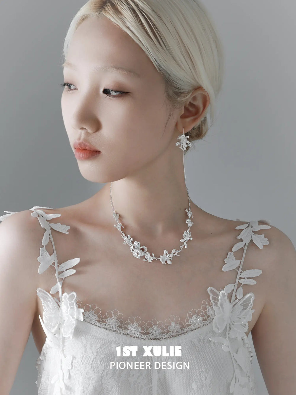 1ST XULIE Jewelry "Irises" Blue Zirconia Iris Necklace in Platinum Plated - On Model Close Up