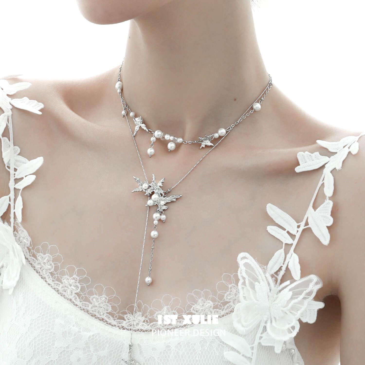1ST XULIE "Whiterfly" Butterfly Tassel Pearl Lariat Necklace in Platinum Plated - On Model Close Up